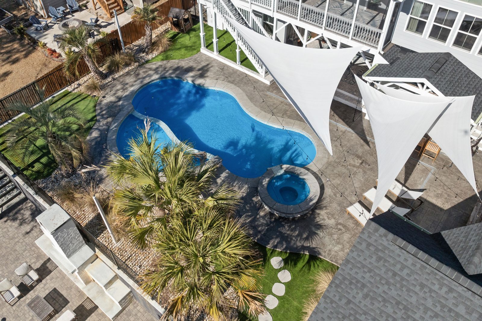 Aerial view of a backyard pool and spa — design inspiration (stock photo)